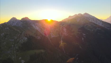 cinematic flight in the alps at sunrise