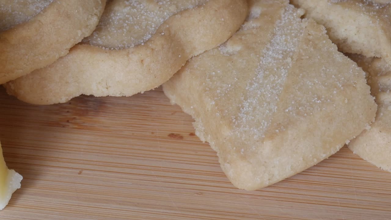 Close-up of delicious shortbread cookies on wooden board