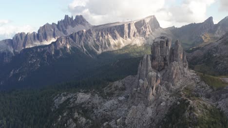 Aerial-of-Cinque-Torri-mountain-spires,-Croda-da-Lago-in-background