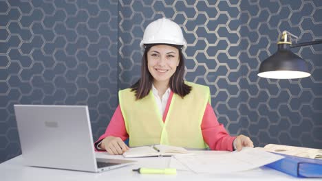 Woman-engineer-nodding-to-the-camera.