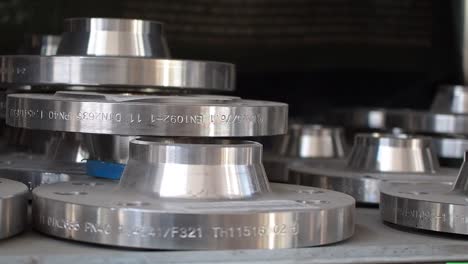 flanges stacked in warehouse