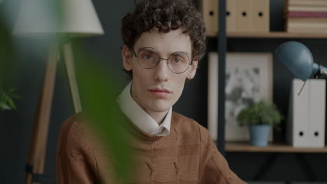 portrait of a young man in a modern office