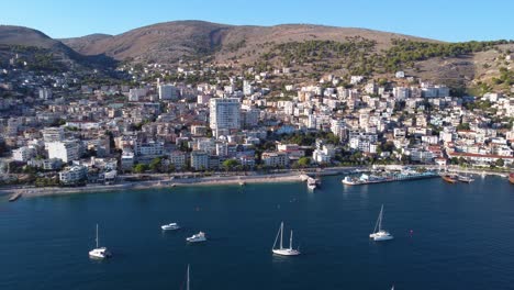 aerial ascending approaching shot of sarande, albania