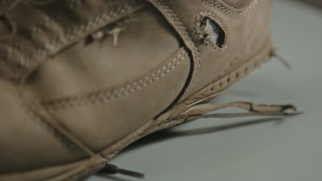 detailed close up of worn hiking boot