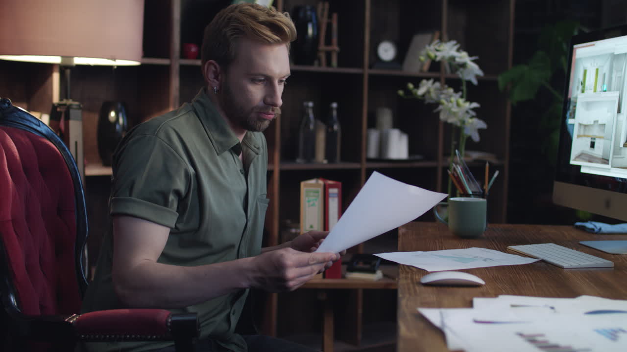 Creative designer reading business project