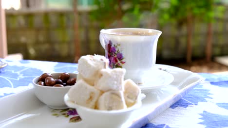 turkish delight and coffee served on the table