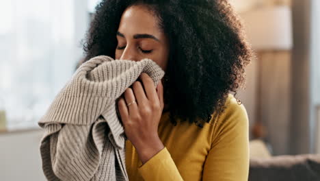 woman smelling fresh laundry