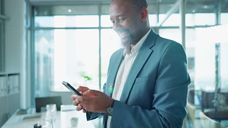 businessman using smartphone in office