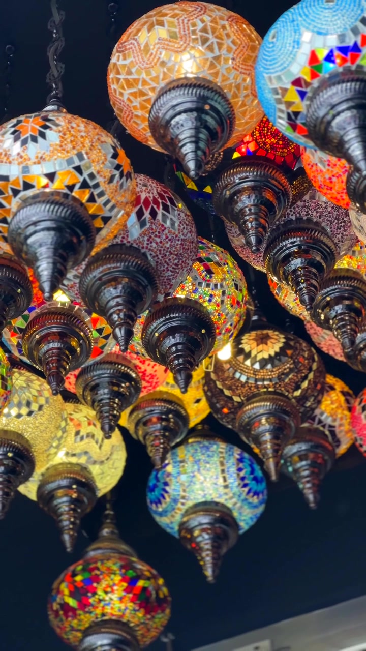 Collection of Colorful Traditional Turkish Mosaic Lamps Hanging from Ceiling
