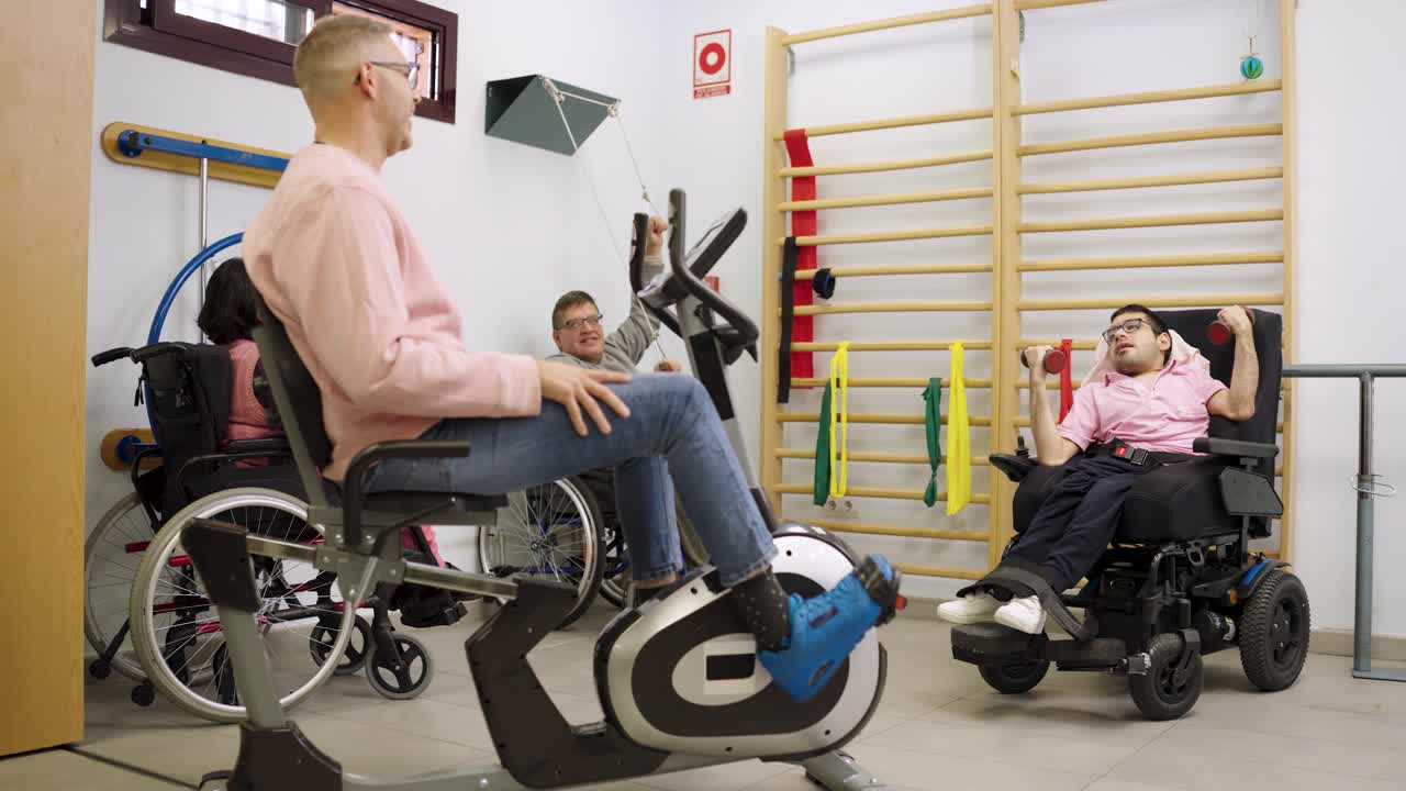 Physical therapy and rehabilitation session with people in a gym