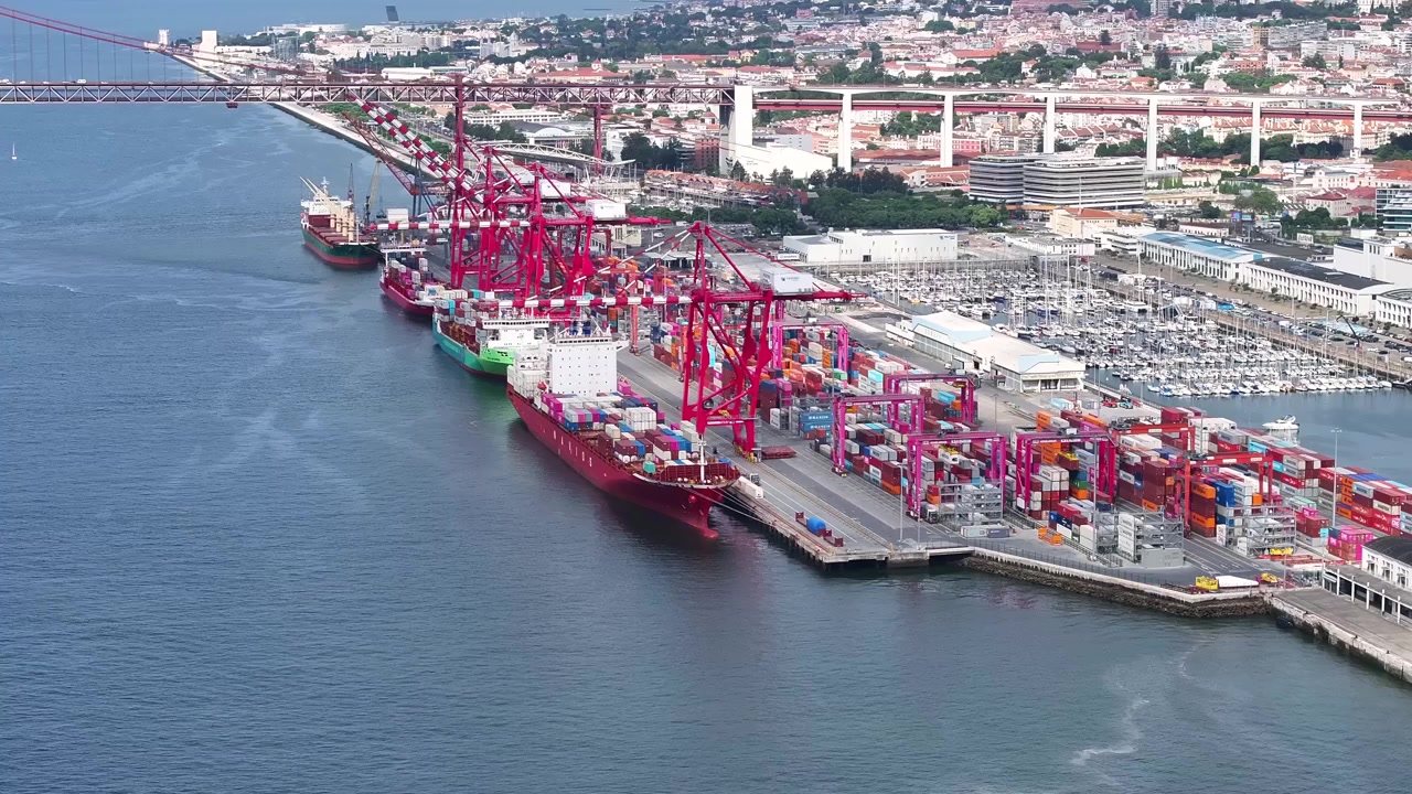 Witness the dynamic operations at a bustling cargo port filled with colorful shipping containers. Marvel at the coordination of container ships delivering goods for global trade and commerce.