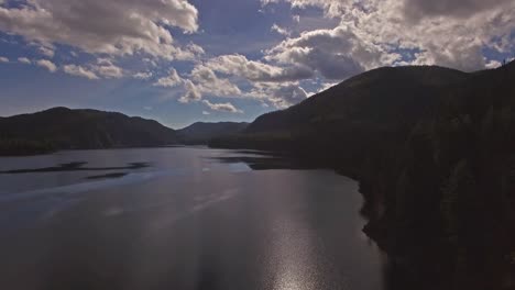 Aerial-Drone-Shot-in-Montana-on-a-lake-with-a-boat-in-the-Fall-or-Autumn