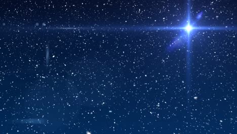 animation of snow falling over glowing star in winter scenery