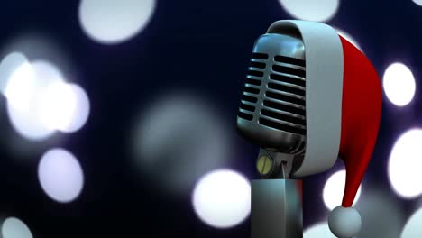 santa hat over microphone against spots of light against black background