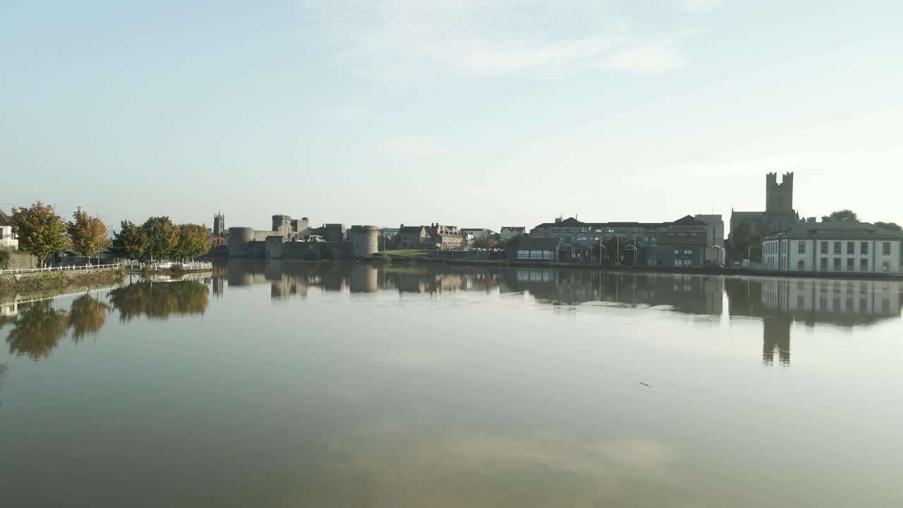 Limerick Castle, Medieval Garden, And Court Office On Banks Of River Shannon In Limerick, Ireland. wide zoom-in shot