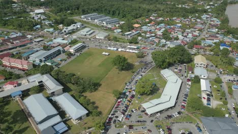 drone view at lundu town during summer, in conjunction of regatta traditional long boat race batang kayan river, with car and bike show.
#regatta