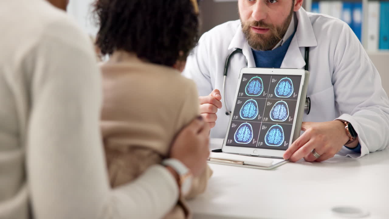 Doctor Explaining Brain Scan Results to Patient