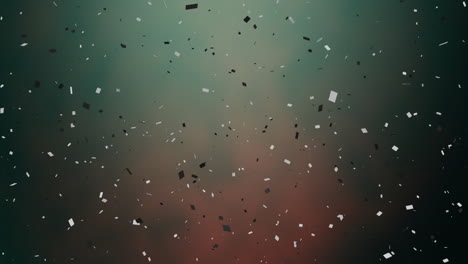 falling confetti animation over blurred green and red background