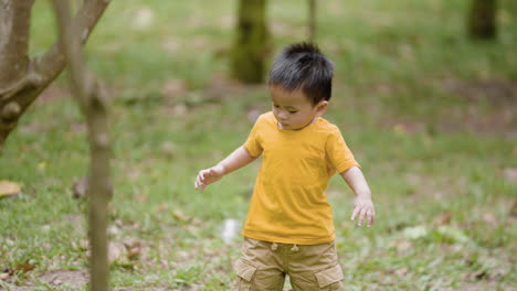 little asian kid outdoors