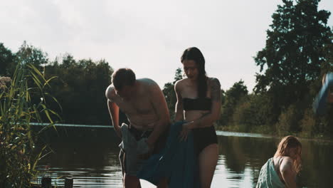 friends enjoying a summer day by the lake