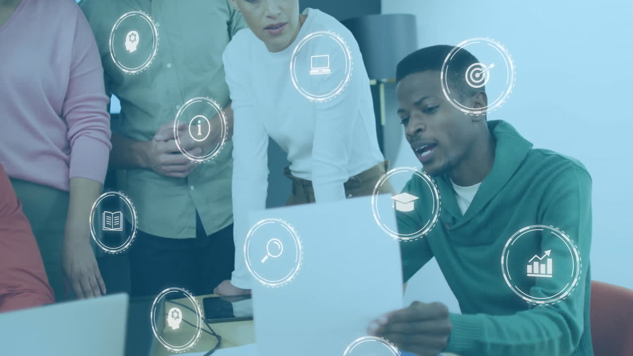 Collaborating with digital icons, diverse team in office creating animation project