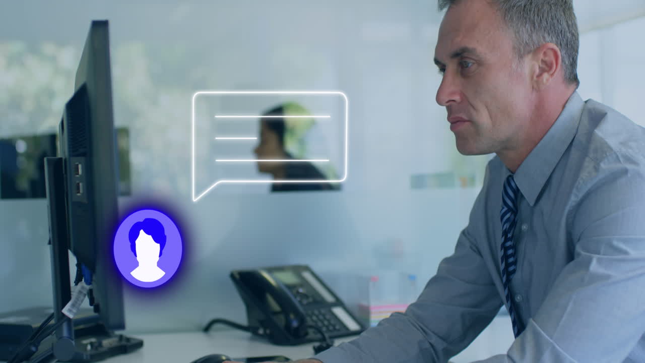 Animation of profile and message icon against caucasian businessman using computer at office