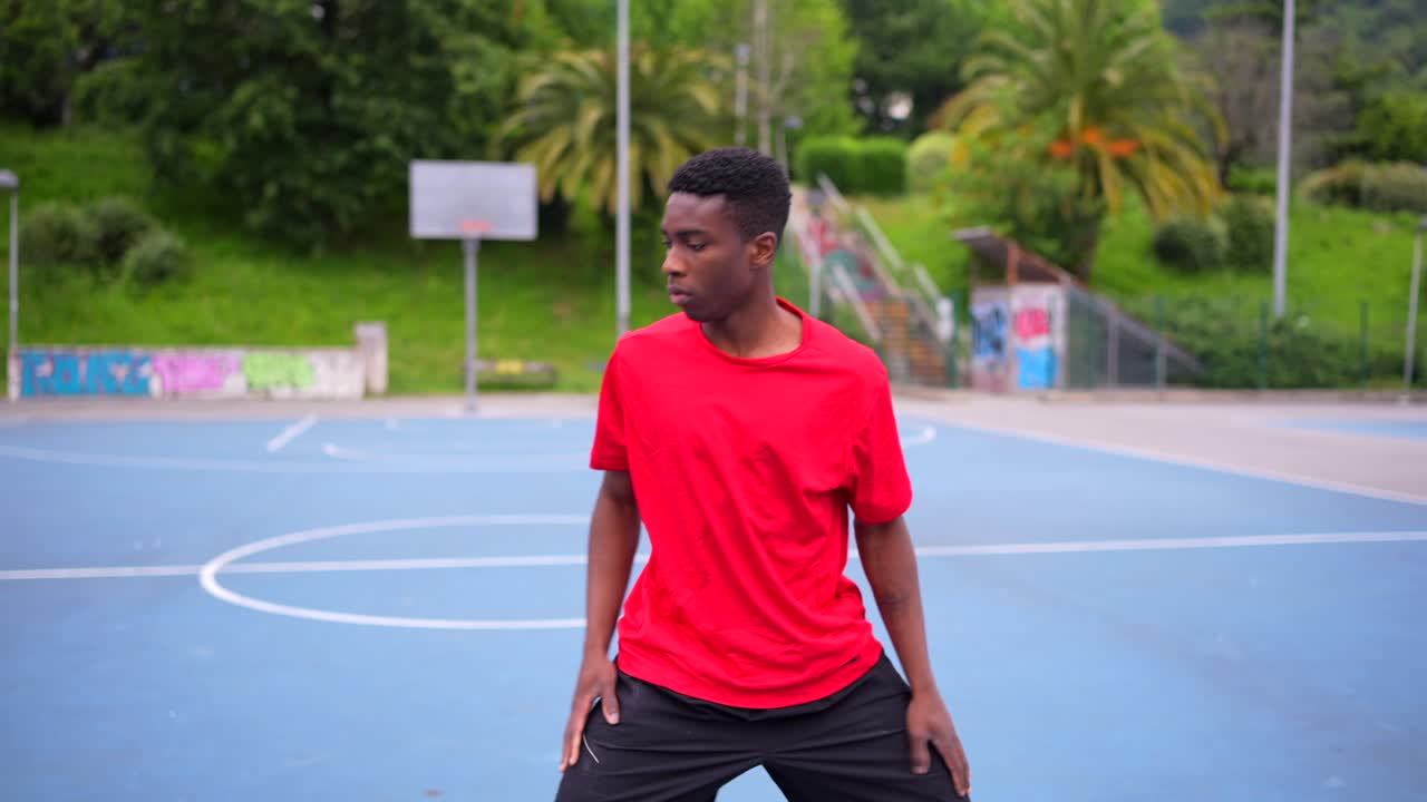 Athlete stretching on a basketball court