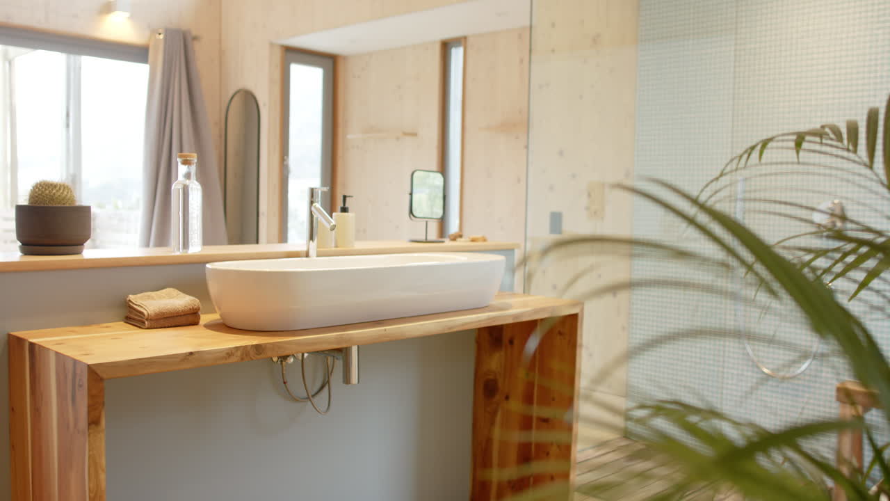 Modern bathroom with wooden countertop and stylish sink, creating cozy atmosphere, copy space