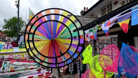 vibrant wind spinner at a market stall