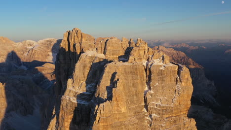 Cinematic-drone-shot-flying-past-the-Tre-Cime-di-Lavaredo-in-Italy