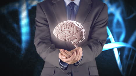 Businessman-presenting-brain-with-hands