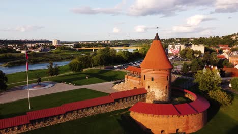 aerial footage of kaunas castle, situated in kaunas old town, lithuania in beautiful sunny evening