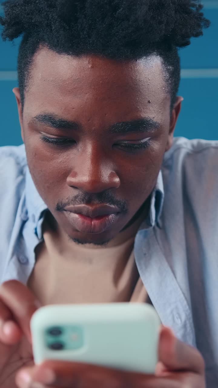 Engaging moment captured in a modern workspace while using a smartphone