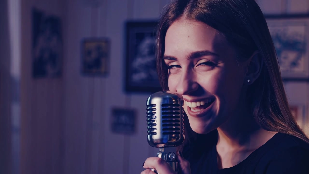 Young Woman Singing into a Vintage Microphone with Emotion