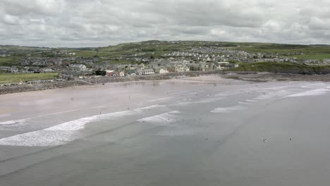 high angle view of sand beach at lahinch, ireland where surfers ride