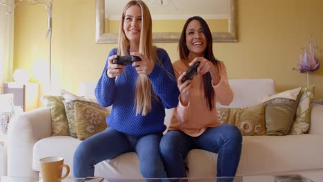 laughing young female video game players