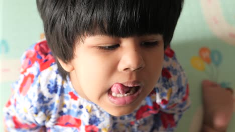 child receiving medication