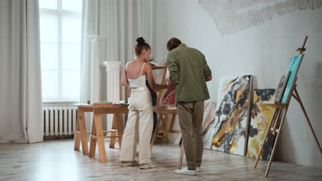 people painting indoors