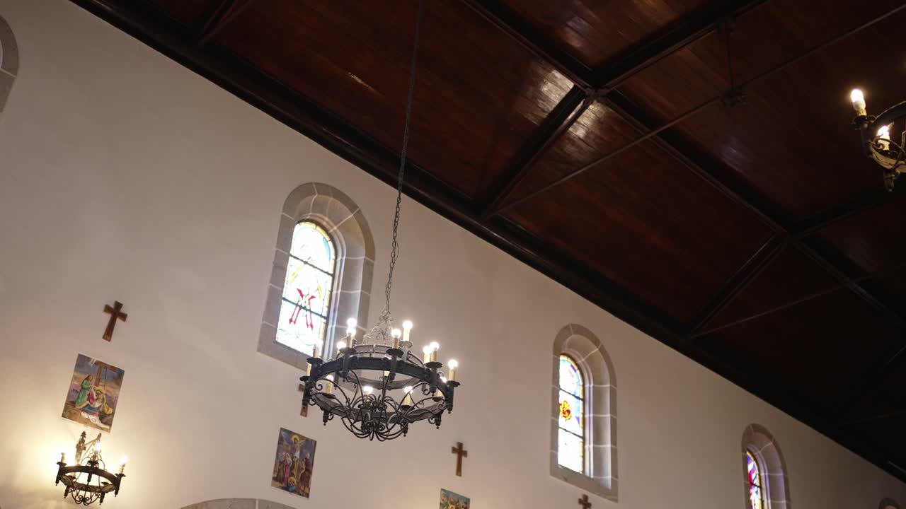 Church Interior with Chandeliers and Stained Glass