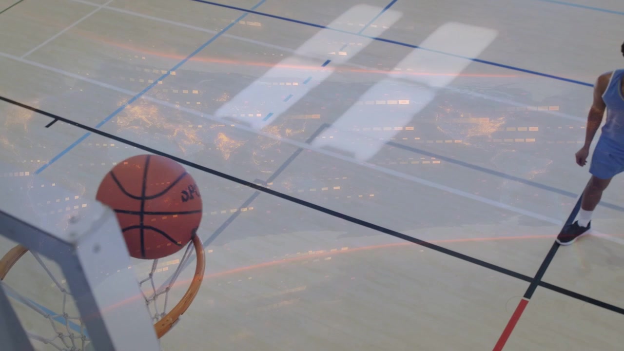Male basketball player dribbling from top, driving, jumping and scoring through rim in practice
