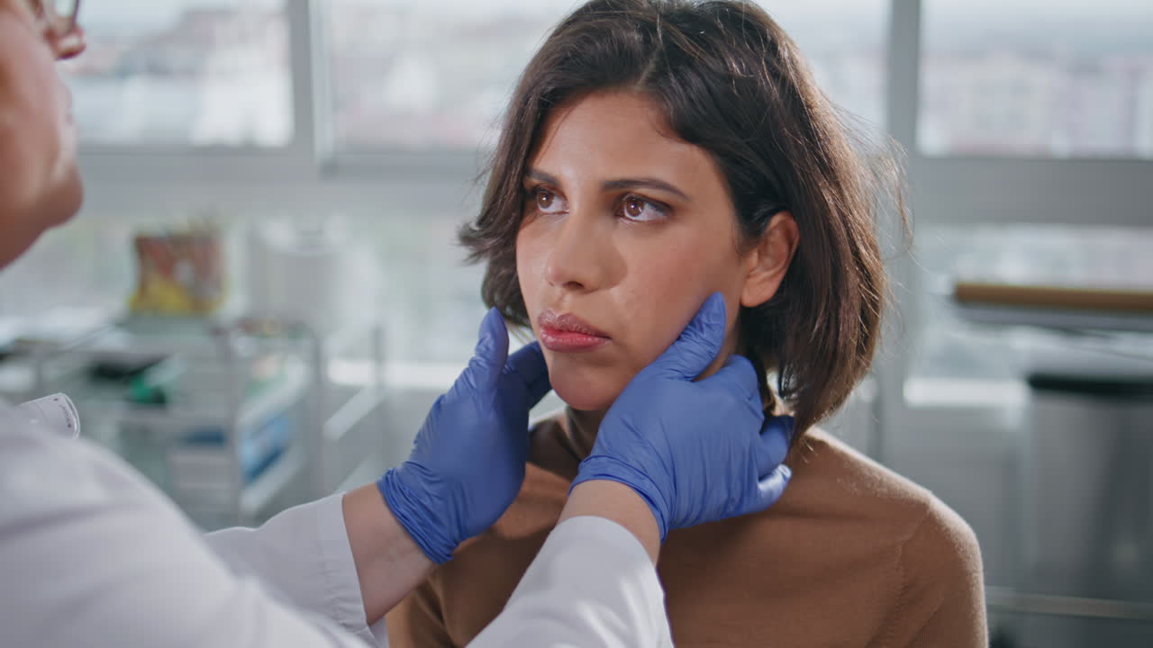 Woman consulting medicare specialist in clinic closeup. Medical professional