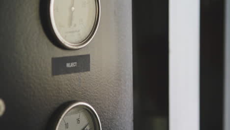 round pressure meters inside a machine room