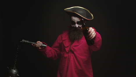 man dressed up like a drunk pirate over black background