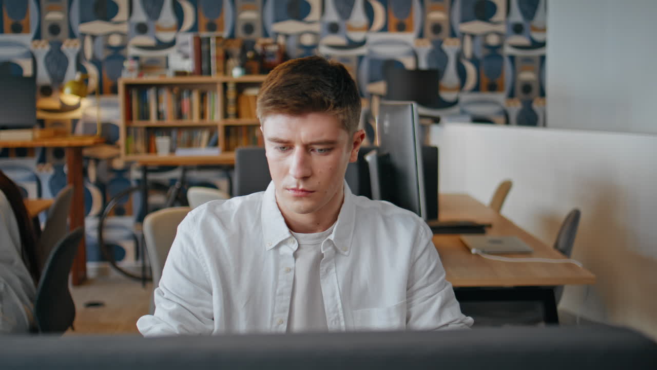 Involved entrepreneur working office closeup. Focused man generating typing pc