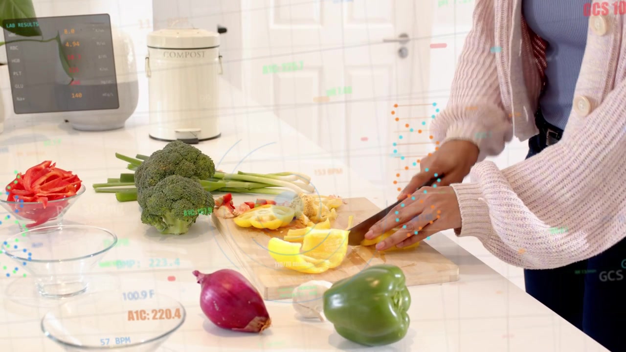 Home cook woman placing knife, initiating slicing yellow bell pepper on board, prepping meal