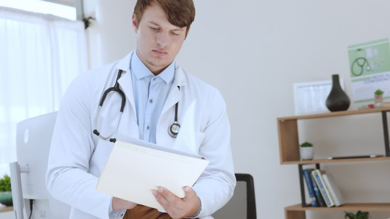 Healthcare, face and man doctor writing in folder