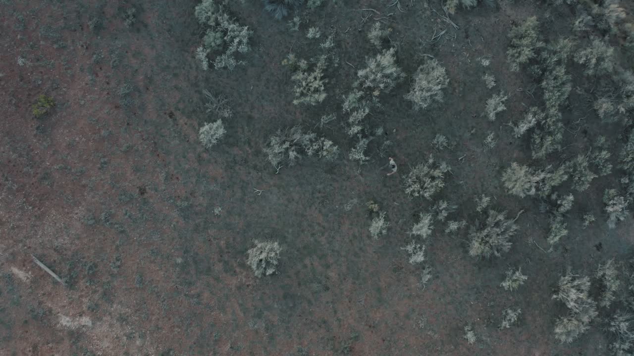 Drone shot of guy hiking in Utah mountains