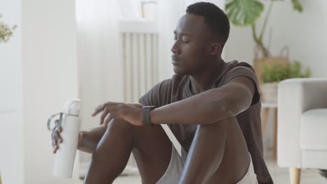 man resting after workout