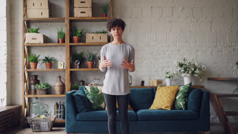 woman practicing yoga at home