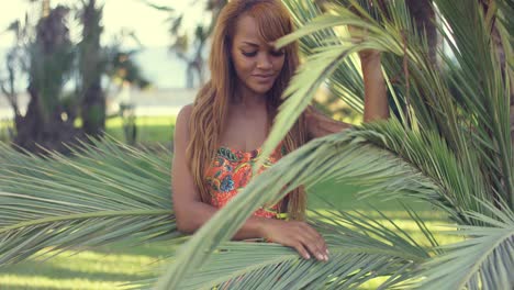 smiling young woman enjoying a tropical vacation